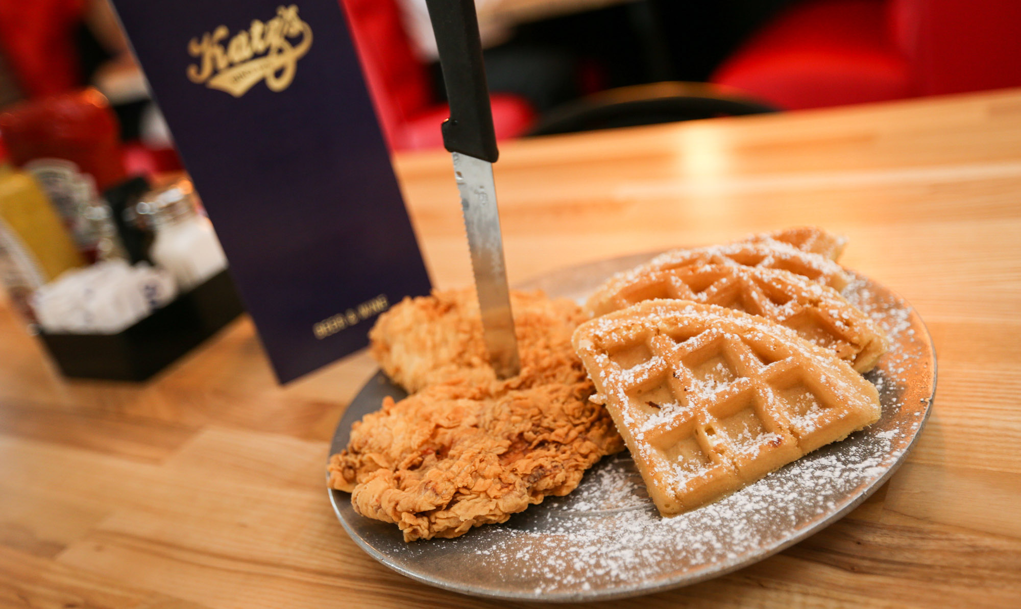 Fried chicken and waffles at Katz's Deli Houston