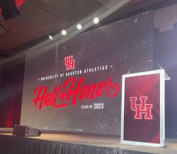 2023 UH Hall of Honor theme graphic on stage