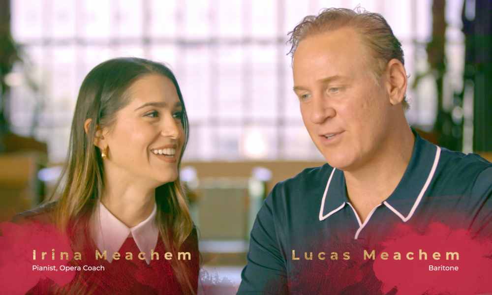 Irina Meachem and Lucas Meachem sit together, smiling and speaking. Their names and titles, 